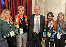 From left to right: Hailey Walsh '28, Andrew Kirchhoff '25, Jonathan Reckford (CEO of Habitat for Humanity), Shane Hermsen '28, and Abiga...