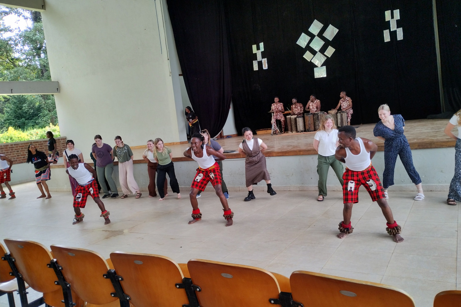 Students participating in indigenous music and dance.